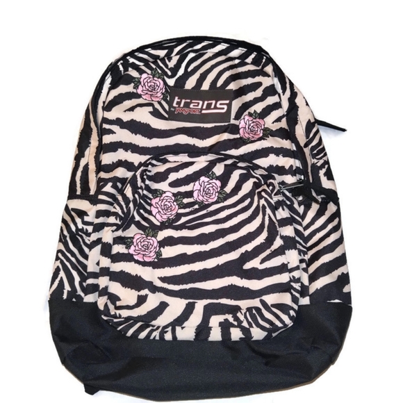 Jansport Handbags - Rose and zebra print JanSport backpack.